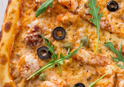 Saucy pizza high in acid content