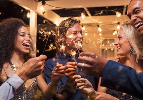 Happy people celebrating the new year