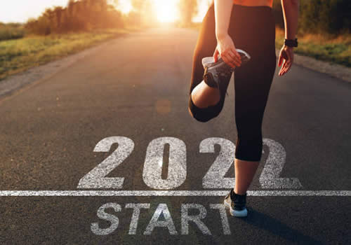 Woman exercising to get healthy in the new year
